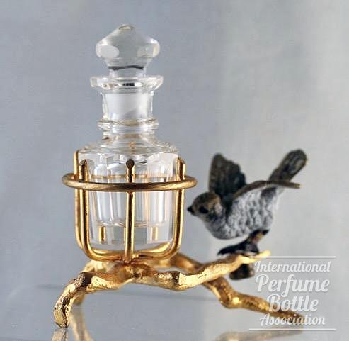 Scent Bottle on Branch With Bird