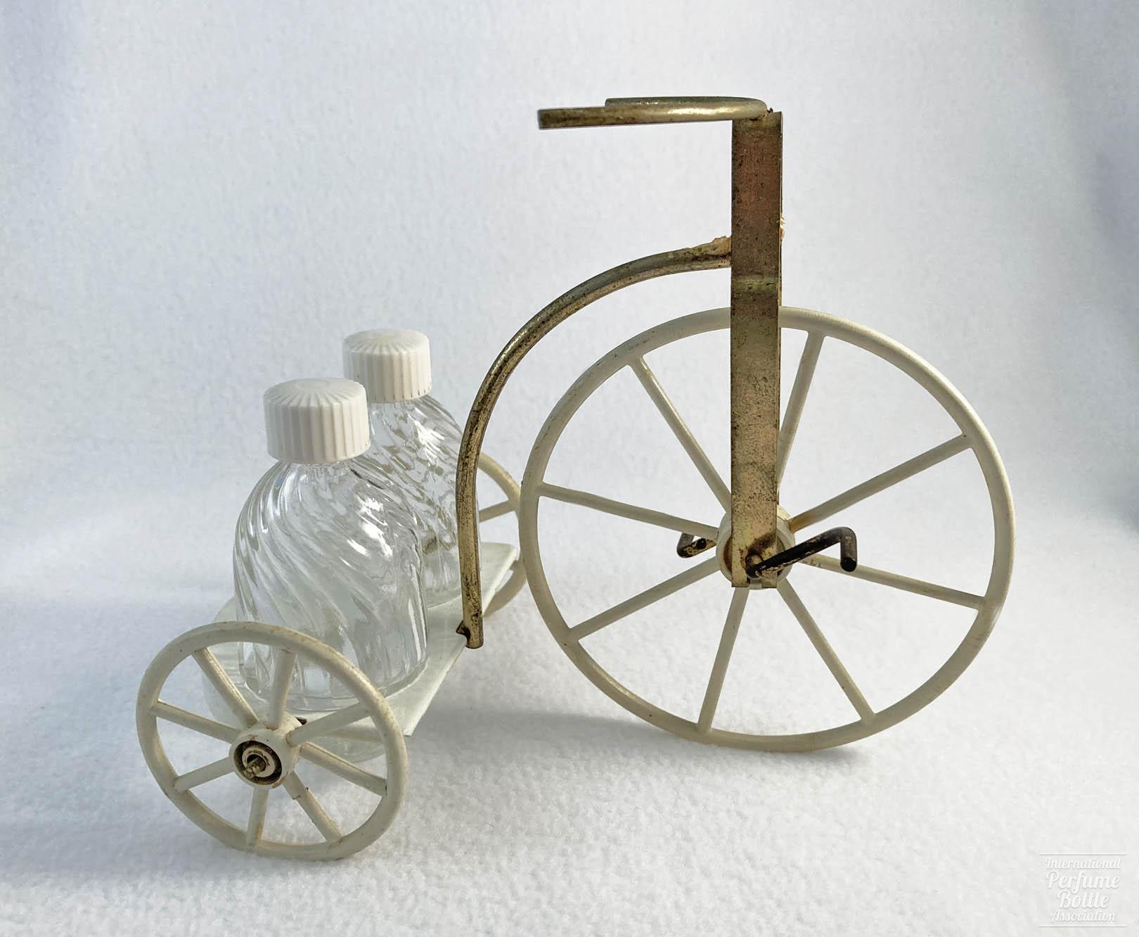Metal Tricycle With Two Mini Perfumes by Rubicon Distr. Co.