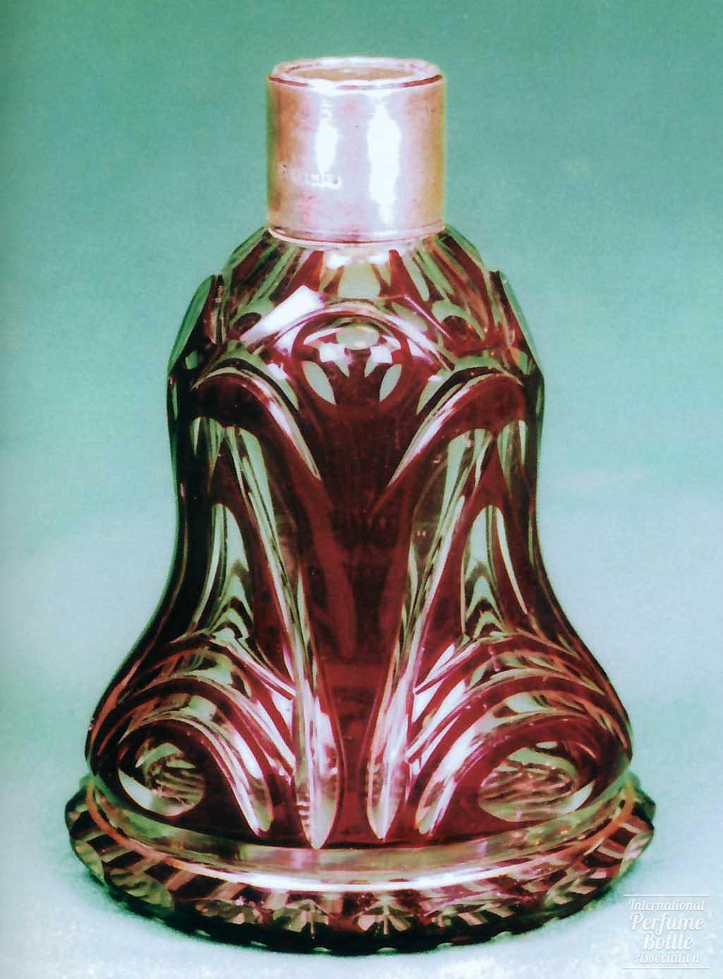 Red and Clear Bell-Shaped Perfume
